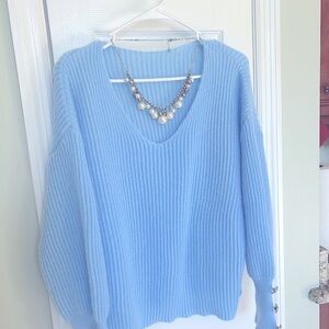 Women's size large sweater shirt (baby blue), pre-owned and in good condition.